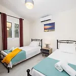 Memi * Spartià